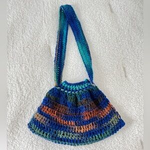 Blue, green and multicolored crochet bag